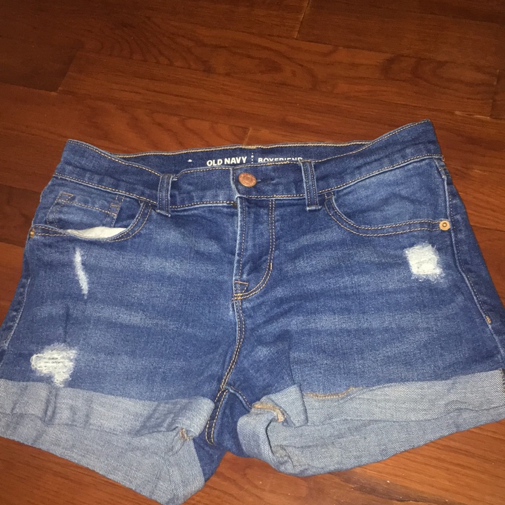 slightly ripped denim shorts